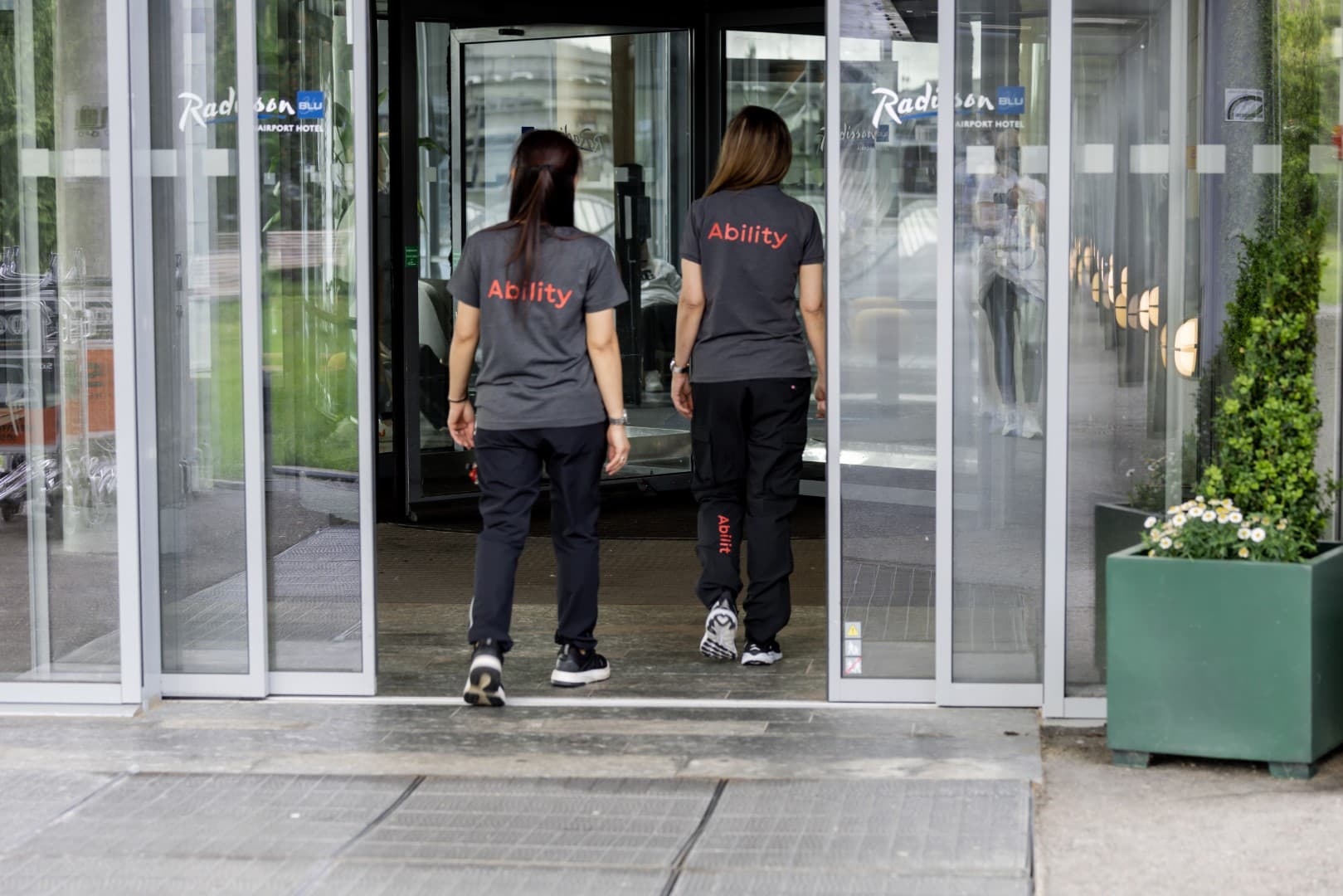 Ability employees entering Radisson Blu Airport Hotel